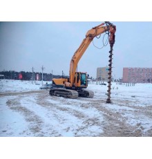 Гусеничный экскаватор с ямобуром Hyundai