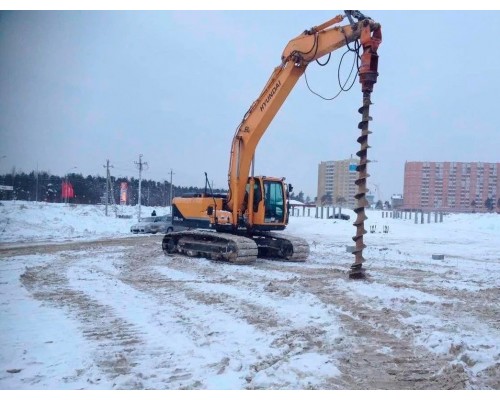 Гусеничный экскаватор с ямобуром Hyundai Гусеничный экскаватор с ямобуром Hyundai